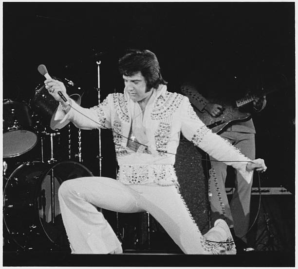 Elvis Presley Kneeling During Performance