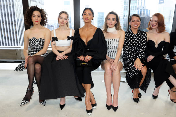 Emmy Rossum, Dove Cameron, Nicole Scherzinger, Chloe Fineman, guest and Madelaine Petsch attend the Carolina Herrera show during the February 2025...