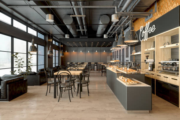 empty coffee shop interior with wooden tables, coffee maker, pastries and pendant lights - home decoration stock pictures, royalty-free photos & images