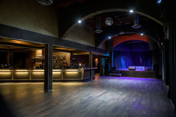 empty music venue with stage and bar - concert stock pictures, royalty-free photos & images