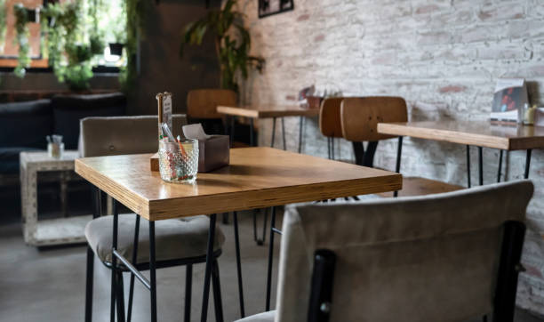 empty table at a restaurant - home decoration stock pictures, royalty-free photos & images