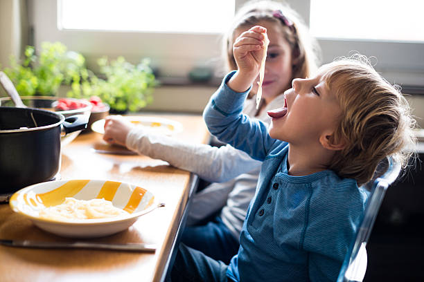 enjoying pasta time - food stockfoto's en -beelden
