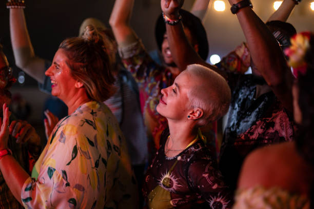enjoying the live show - concert stock pictures, royalty-free photos & images