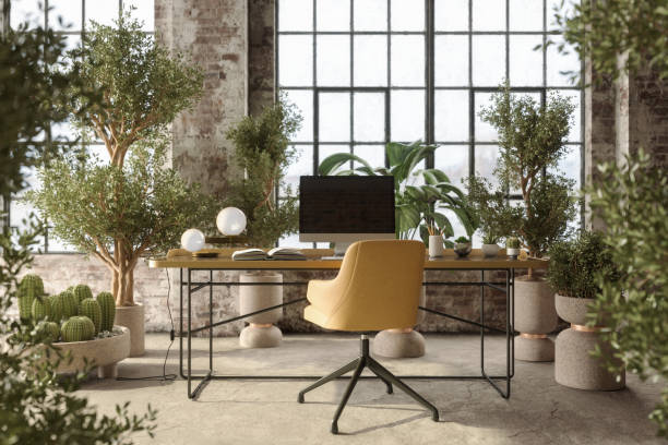 environmentally friendly office space with table, office chair, desktop computer and plants - home decoration stock pictures, royalty-free photos & images