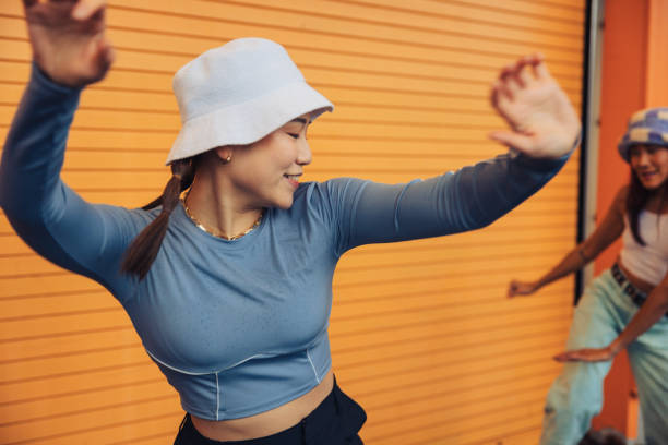 expert professional dancer performing in the city street - fashion stock pictures, royalty-free photos & images