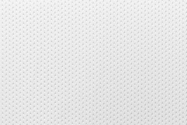 fabric for sports clothing in a white color, the texture of a football shirt jersey, and a textile background - fashion stock pictures, royalty-free photos & images