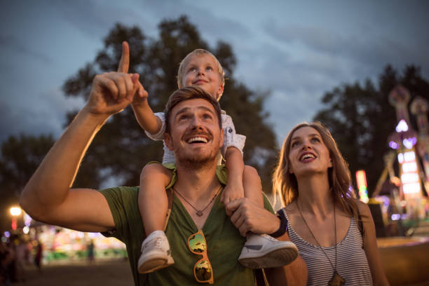 family enjoy on summer festival - concert stock pictures, royalty-free photos & images