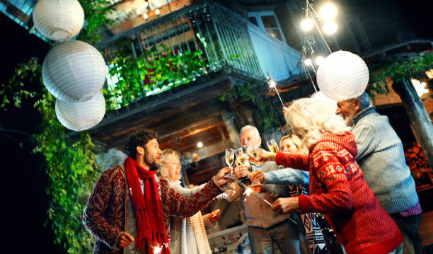 family having a party. - garden decoration stock pictures, royalty-free photos & images