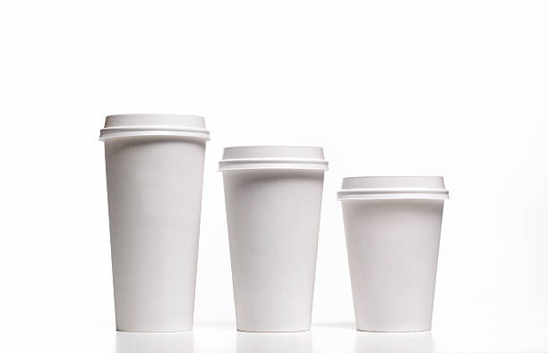 family of disposable coffee/tea cups - junk food stock pictures, royalty-free photos & images