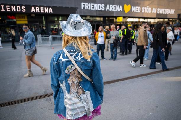 Fan of US musician Beyonce poses with her hand made jacket as she about to enter to the Friends Arena to watch her first concert of the World Tour...