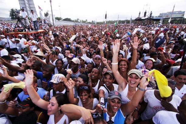 Fans cheer during the concert for Peace Without Borders, featuring some 15 Latin American, Spanish and Cuban performers, at the Revolution Square, on...