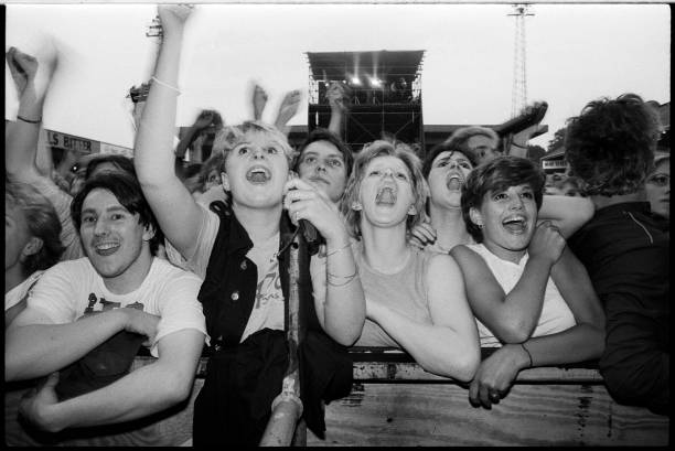Fans cheering in the crowd at a Duran Duran concert in Villa Park, Birmingham, 23rd July 1983.