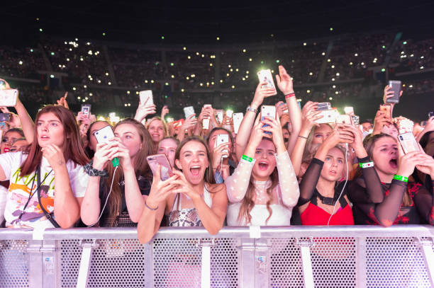 Fans enjoy Khalid performance on stage at The SSE Hydro on September 20, 2019 in Glasgow, Scotland.