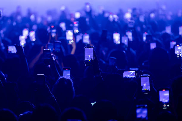 Fans hold up their phones and record as Kehlani performs onstage at Byline Bank Aragon Ballroom on September 06, 2024 in Chicago, Illinois.