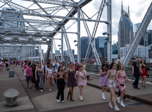 Fans make their way across the People's Bridge to Nissan Stadium ahead of artist Taylor Swift's second night of performance on May 6, 2023 in...