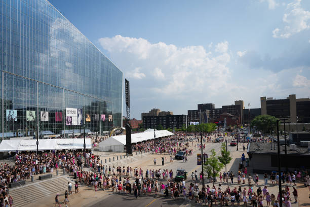 Fans wait for doors to open for the first of two Taylor Swift concerts during the Eras Tour outside U.S. Bank Stadium in downtown Minneapolis, Minn.,...