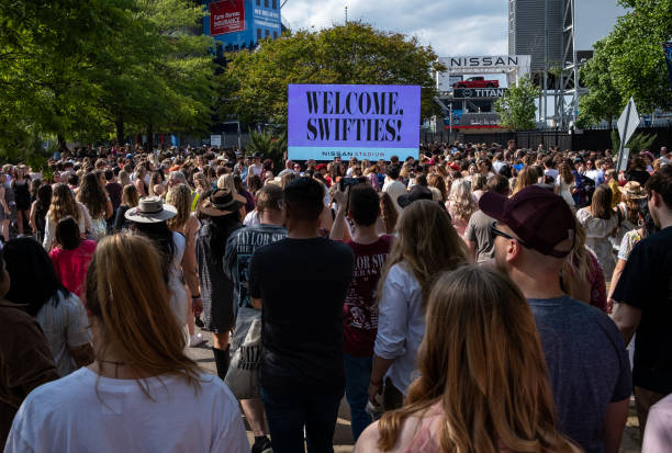 Fans wait in line outside of Nissan Stadium ahead of artist Taylor Swift's second night of performance on May 6, 2023 in Nashville, Tennessee....