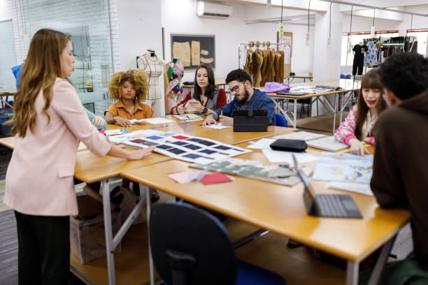 fashion students during a lecture - fashion stock pictures, royalty-free photos & images