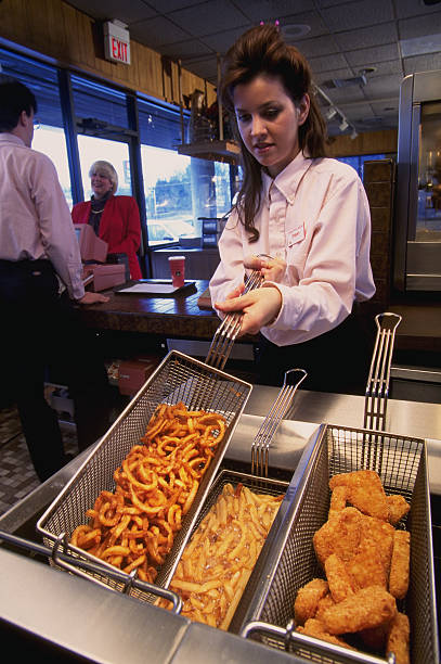 fast food frying - junk food stock pictures, royalty-free photos & images