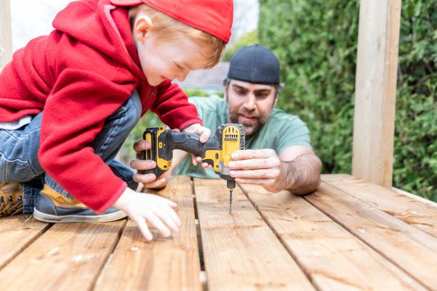 father and son doing a construction project while in quarantine - home decoration stock pictures, royalty-free photos & images