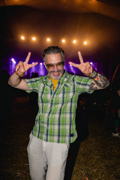 feeling happy and ready to party - concert stock pictures, royalty-free photos & images