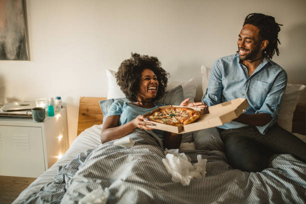 feeling sick - junk food stock pictures, royalty-free photos & images