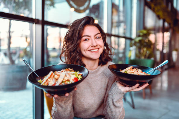 female and her salad choice - food stock pictures, royalty-free photos & images