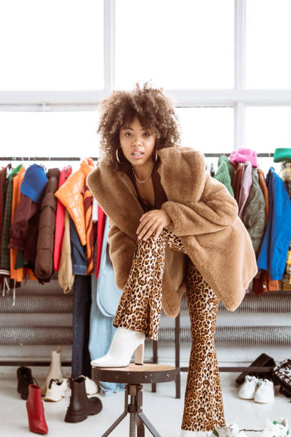 female influencer wearing fake fur coat - fashion stock pictures, royalty-free photos & images