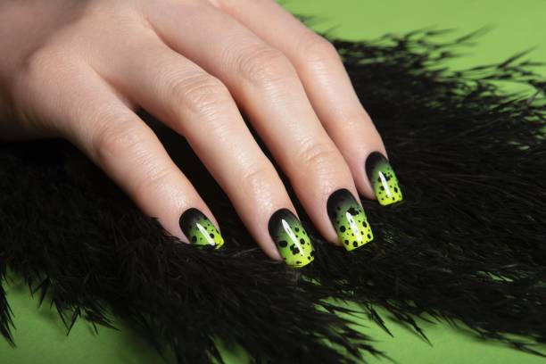 female neat hand with short natural nails painted with green nail polish. natural, cozy, elegant, modern look. high-quality photo - nails art stock pictures, royalty-free photos & images