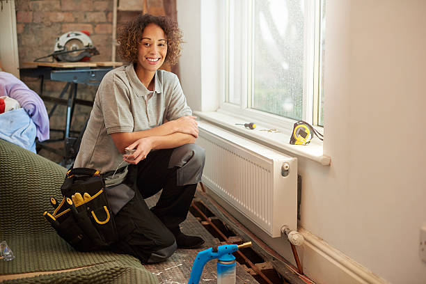 female plumber on site - home decoration stock pictures, royalty-free photos & images