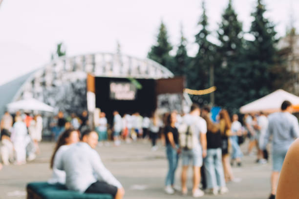 festival event party with people blurred background - concert stock pictures, royalty-free photos & images