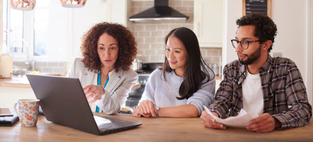 financial advisor visit - home decoration stock pictures, royalty-free photos & images