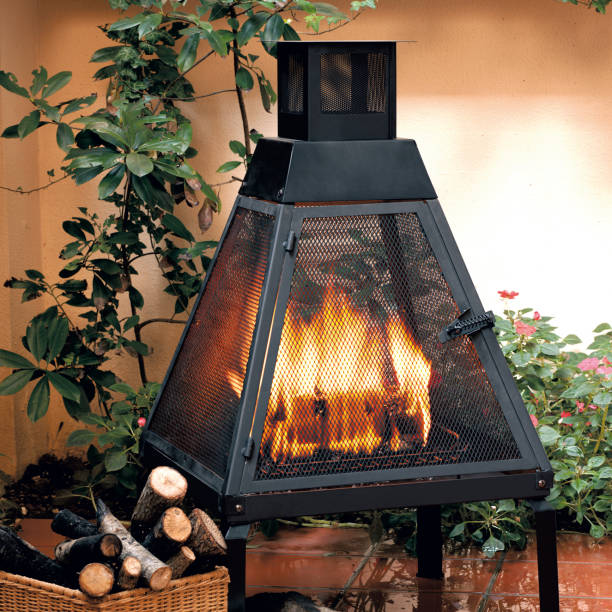 fireplace fire - garden decoration stock pictures, royalty-free photos & images