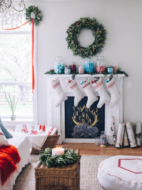 fireplace with stockings - home decoration stock pictures, royalty-free photos & images