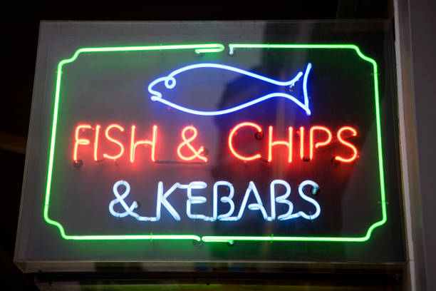 fish and chip shop sign - junk food stock pictures, royalty-free photos & images
