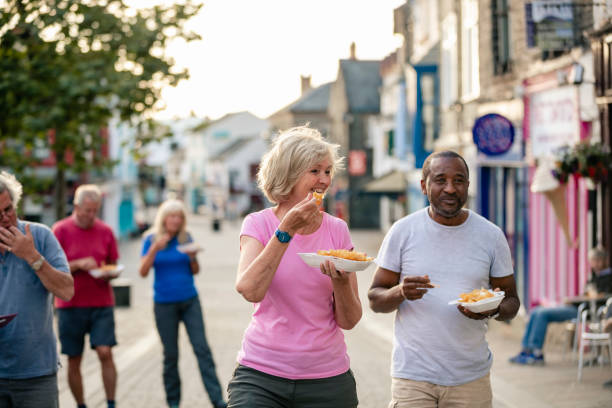 fish and chips for all - junk food stock pictures, royalty-free photos & images
