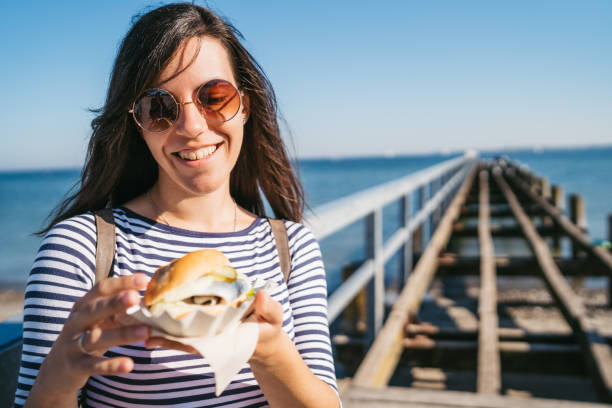 fish sandwich at travemünde - junk food stock pictures, royalty-free photos & images