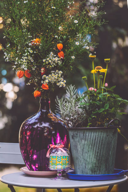 flowers in the garden - garden decoration stockfoto's en -beelden