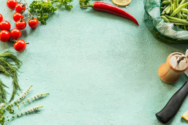 food background frame with seasoning, chili pepper, green beans and knife - food stock pictures, royalty-free photos & images