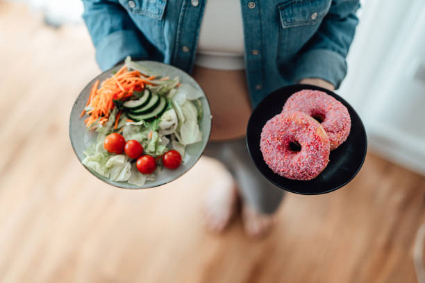 food choice during pregnancy - junk food stock pictures, royalty-free photos & images