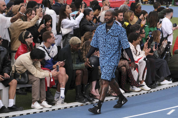 Footbaler Djibril Cissé walks the runway during the Marine Serre Menswear Spring Summer 2023 show as part of Paris Fashion Week on June 25, 2022 in...