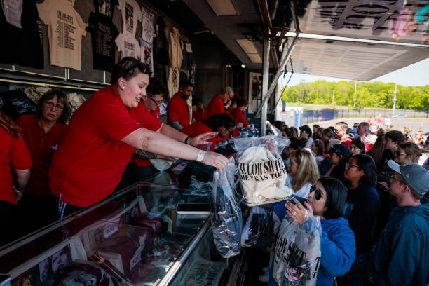 Foxborough, MA Hundreds stood in line for hours to get their official Taylor Swift merchandise before the pop star's weekend concerts at Gillette...