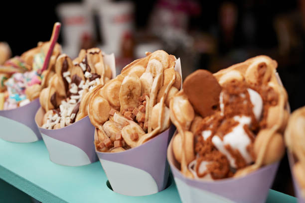 fresh dessert on display at concession stand - concert stock pictures, royalty-free photos & images