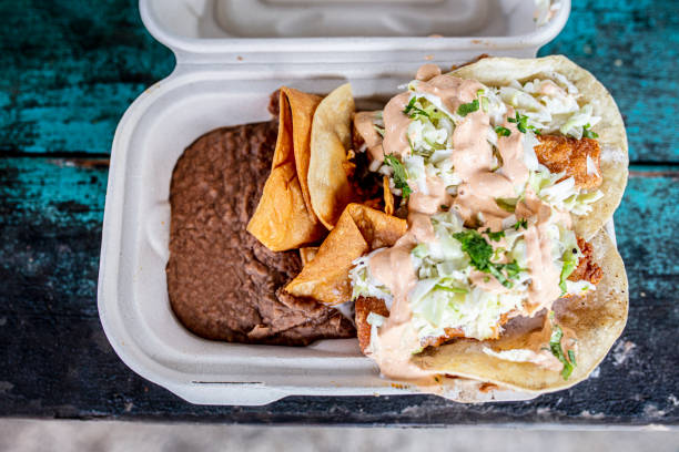 fresh fish tacos with beans - food to go - junk food stock pictures, royalty-free photos & images