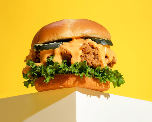 fried chicken sandwich - junk food stock pictures, royalty-free photos & images