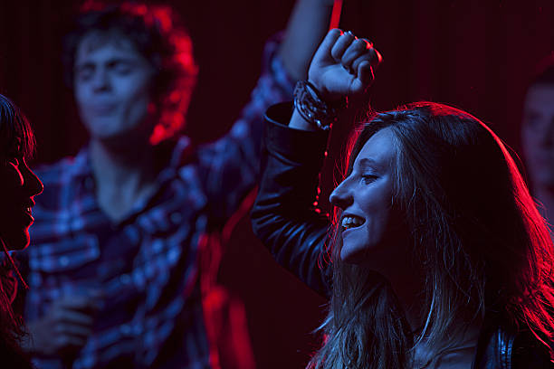 friends at a concert - concert stock pictures, royalty-free photos & images