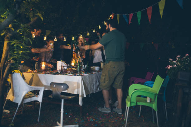 friends at birthday party - garden decoration stock pictures, royalty-free photos & images