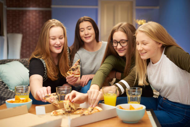 friends catching up - junk food stock pictures, royalty-free photos & images