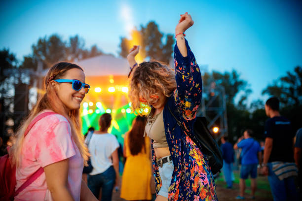 friends enjoying at music festival - concert stock pictures, royalty-free photos & images
