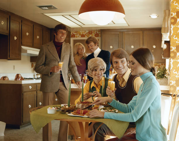 friends enjoying food party in kitchen - home decoration stock pictures, royalty-free photos & images
